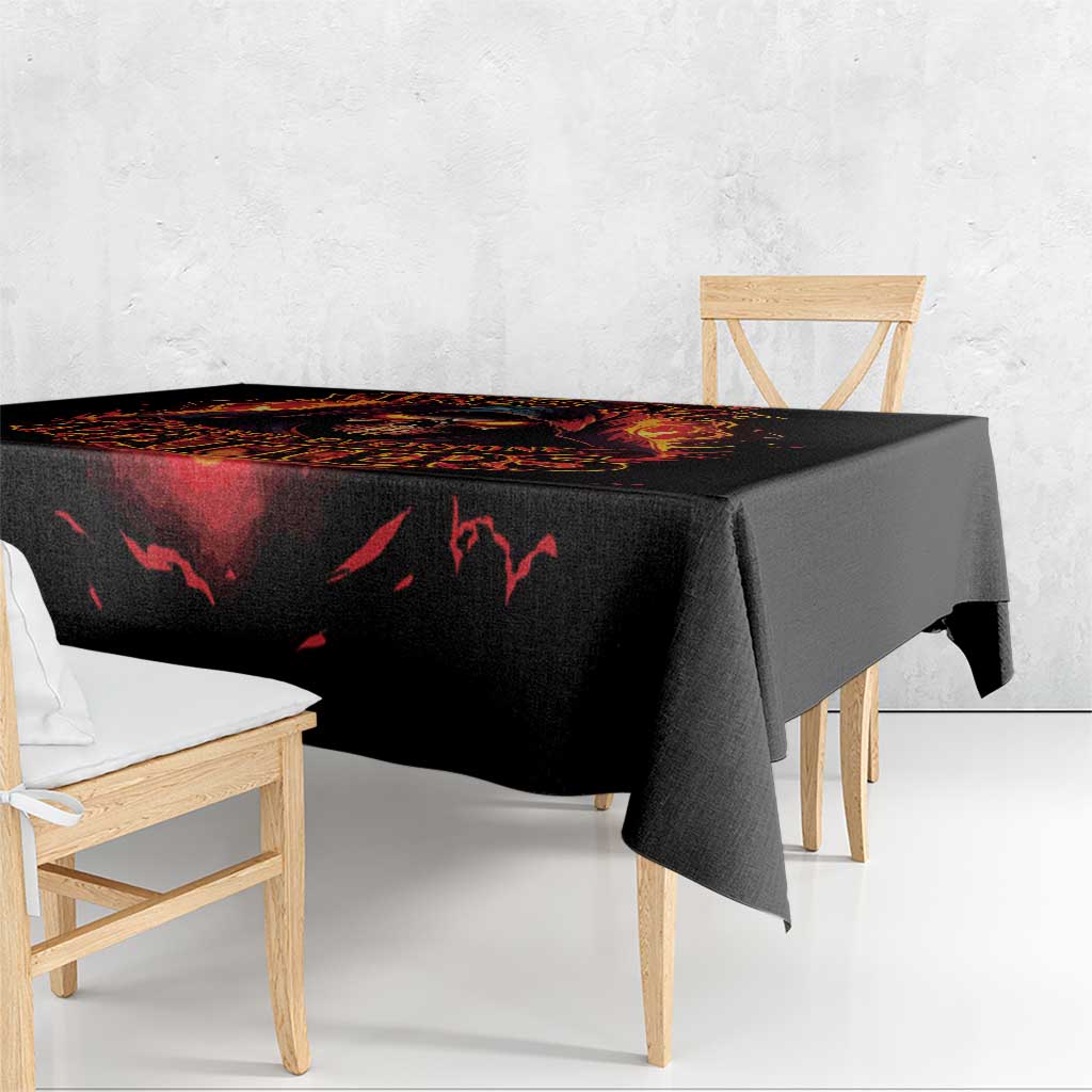 Black tablecloth with fiery skull banner graphic, straight drape over dining table