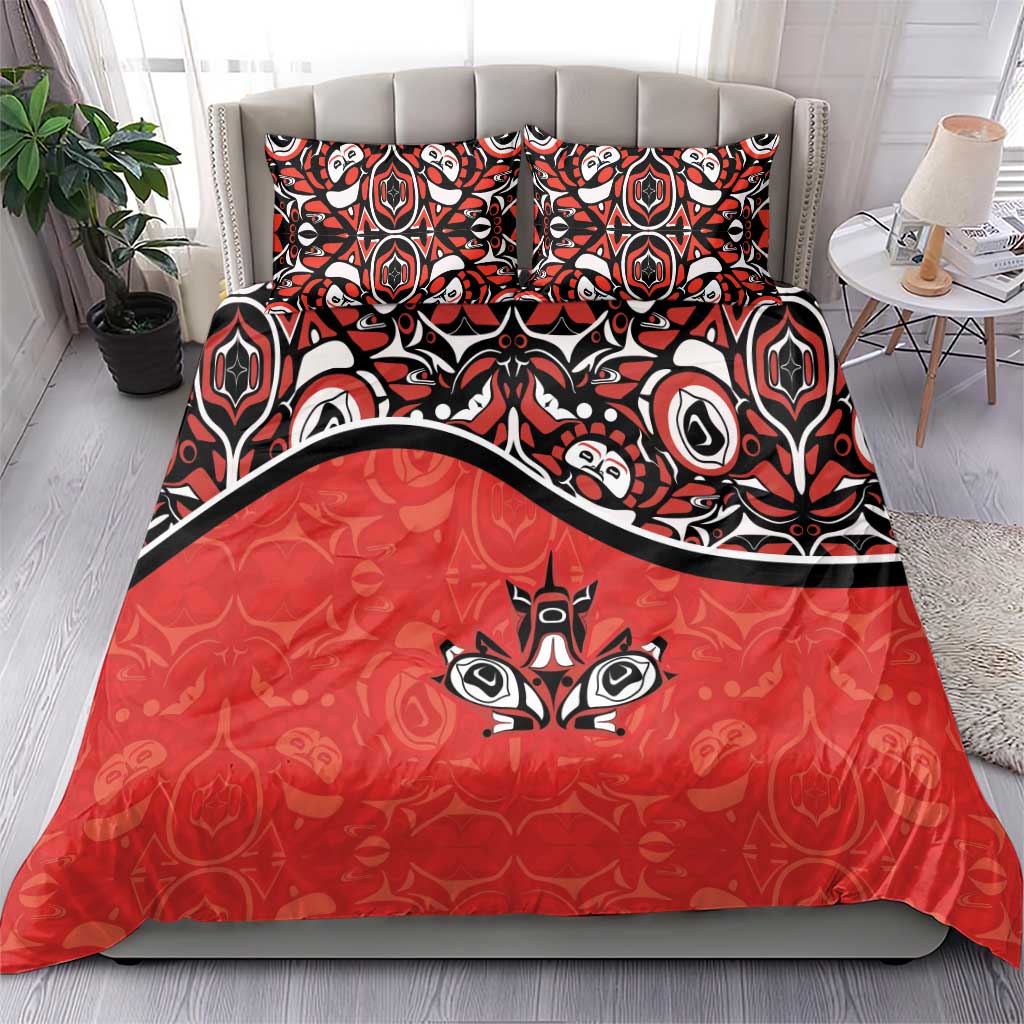 Red and black tribal tattoo-style bedding set with patterned pillowcases and duvet cover