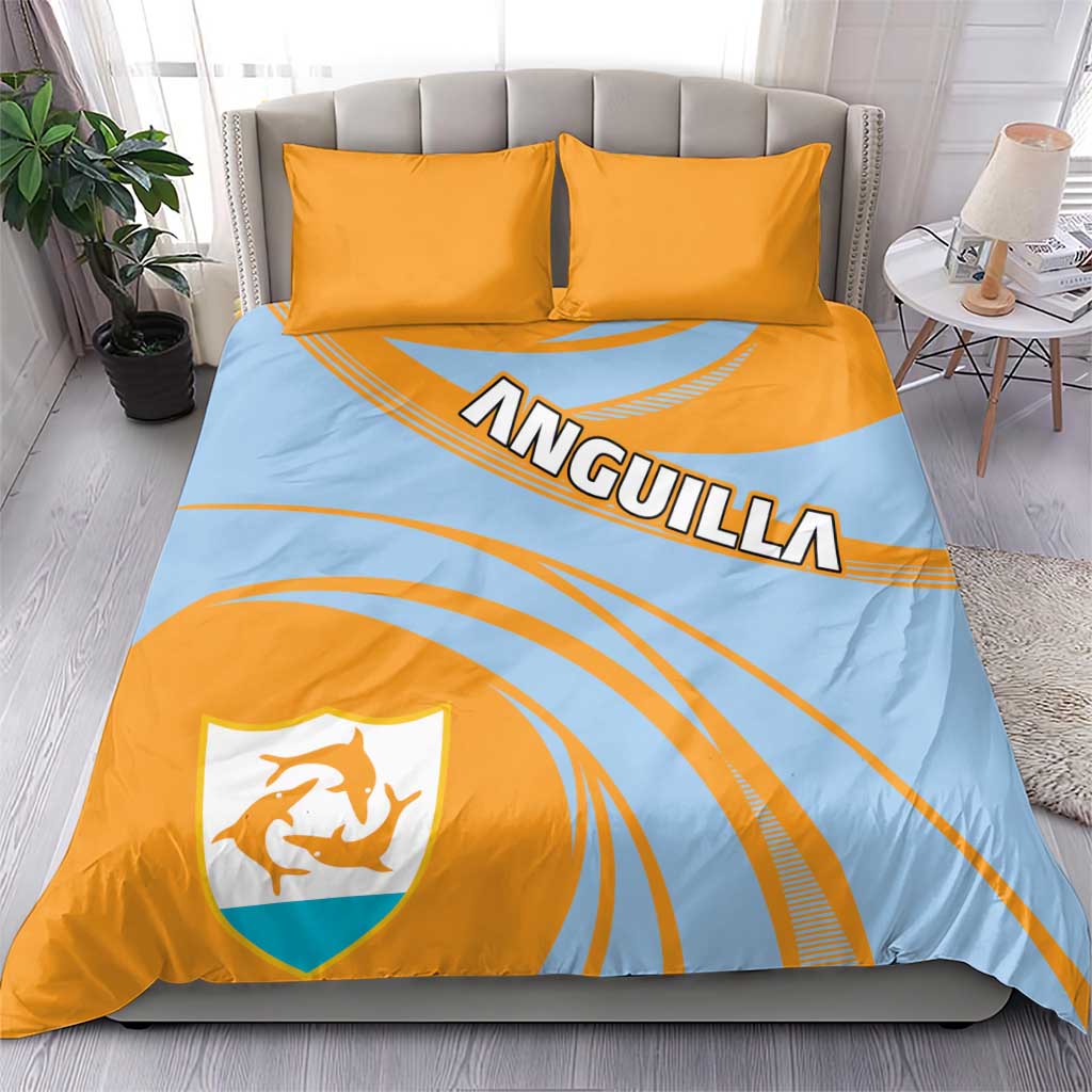 Light blue duvet with orange curved stripes, ANGUILLA logo, crest shield, plus two yellow pillowcases