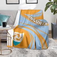 Cricket-style throw blanket folded on couch with orange-and-light-blue stripes and shield emblem.