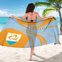 Light blue and yellow sarong draped wide, featuring crest shield logo