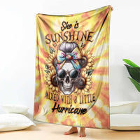 Yellow tie-dye skull graphic blanket with 'Mixed with a little Hurricane' text, standing