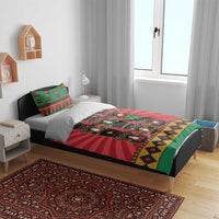 Nutcracker-themed bedding set on bed: red and green duvet with two pillow shams
