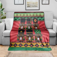 Christmas nutcracker-themed blanket with red, green, and yellow character print