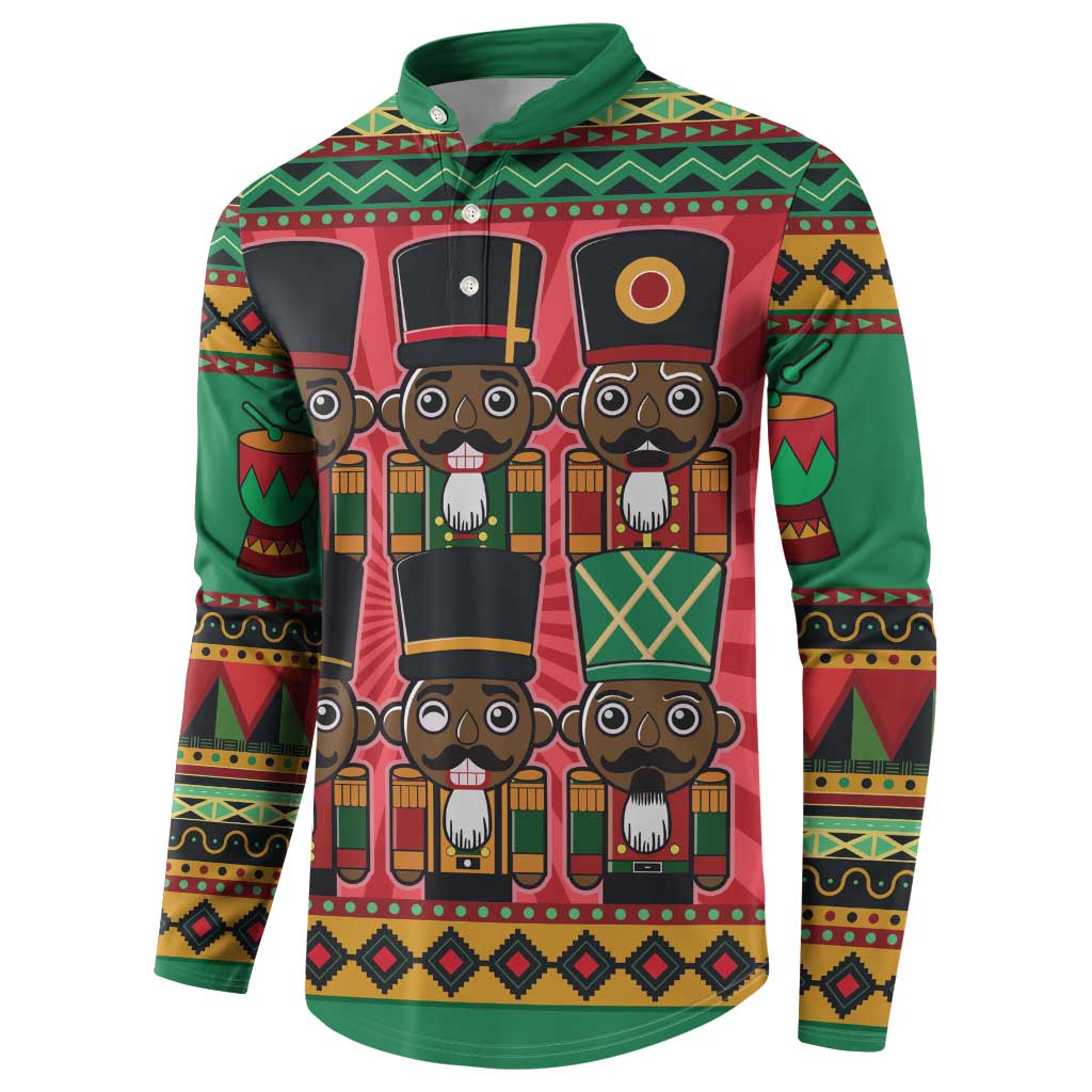 Green long-sleeve button sweatshirt featuring stacked nutcracker faces across chest