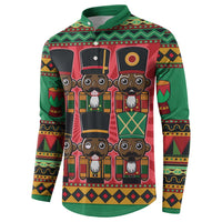 Green long-sleeve button sweatshirt featuring stacked nutcracker faces across chest