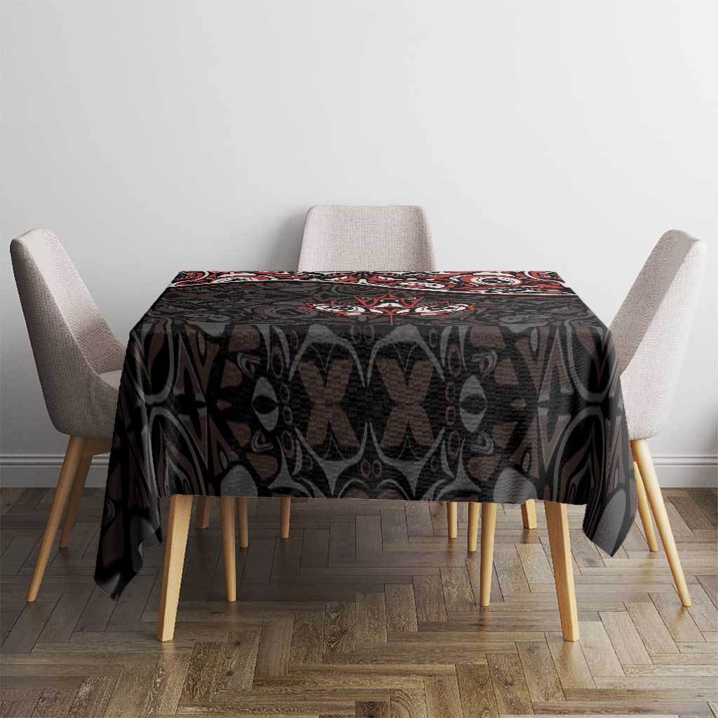Black rectangular tablecloth with red and white Haida-style maple leaf tattoo pattern