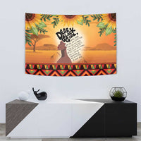 Yellow wall tapestry with woman silhouette, pride lettering, leaf crown, and tribal geometric strip
