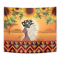 Yellow tapestry close-up with woman profile, pride lettering, sunflowers, and geometric base pattern