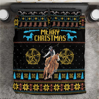 Black cowboy Christmas bedding set with Merry Christmas graphic, blue trees, and gold stars