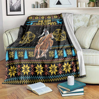 Black cowboy Christmas blanket with 'Merry Christmas' text, horses and gold star motifs