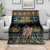 Black cowboy Christmas blanket draped on a couch, 'Merry Christmas' and horse graphic