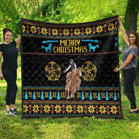 Black quilt with “Merry Christmas” text, blue horses, cowboy, and gold star motifs.