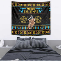 Christmas tapestry with cowboy on horse, gold star symbols, and “Merry Christmas” text