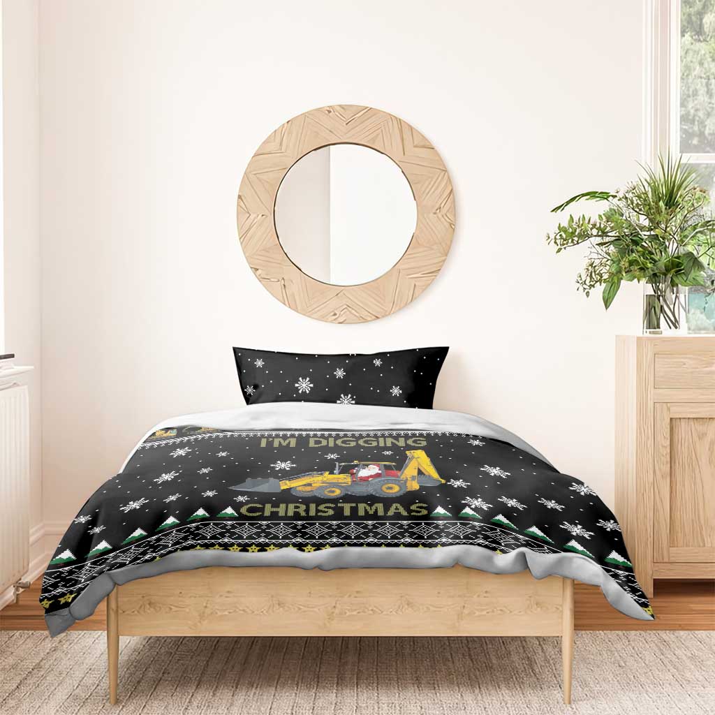 Black Christmas bedding set on bed; 'I'm Digging Christmas' tractor and snowflake pattern