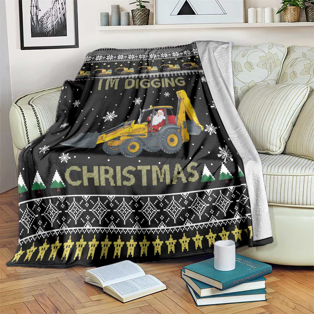 Black Christmas blanket with yellow construction vehicle, Santa figure, snowy stars and trim