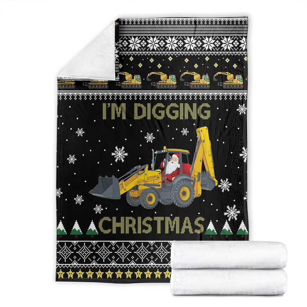 Black Christmas blanket with tractor-and-Santa center graphic, patterned top and bottom borders