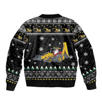 Unisex black bomber jacket with tractor scene and Christmas lights pattern, ribbed hem