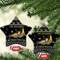Black ceramic star-shaped Christmas ornaments with yellow tractor and Santa, “I’M DIGGING CHRISTMAS”