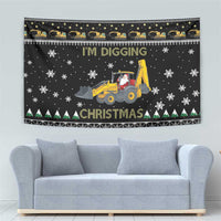 Christmas tapestry wall hanging on dark fabric with yellow tractor, Santa, 'I'M DIGGING' and snow