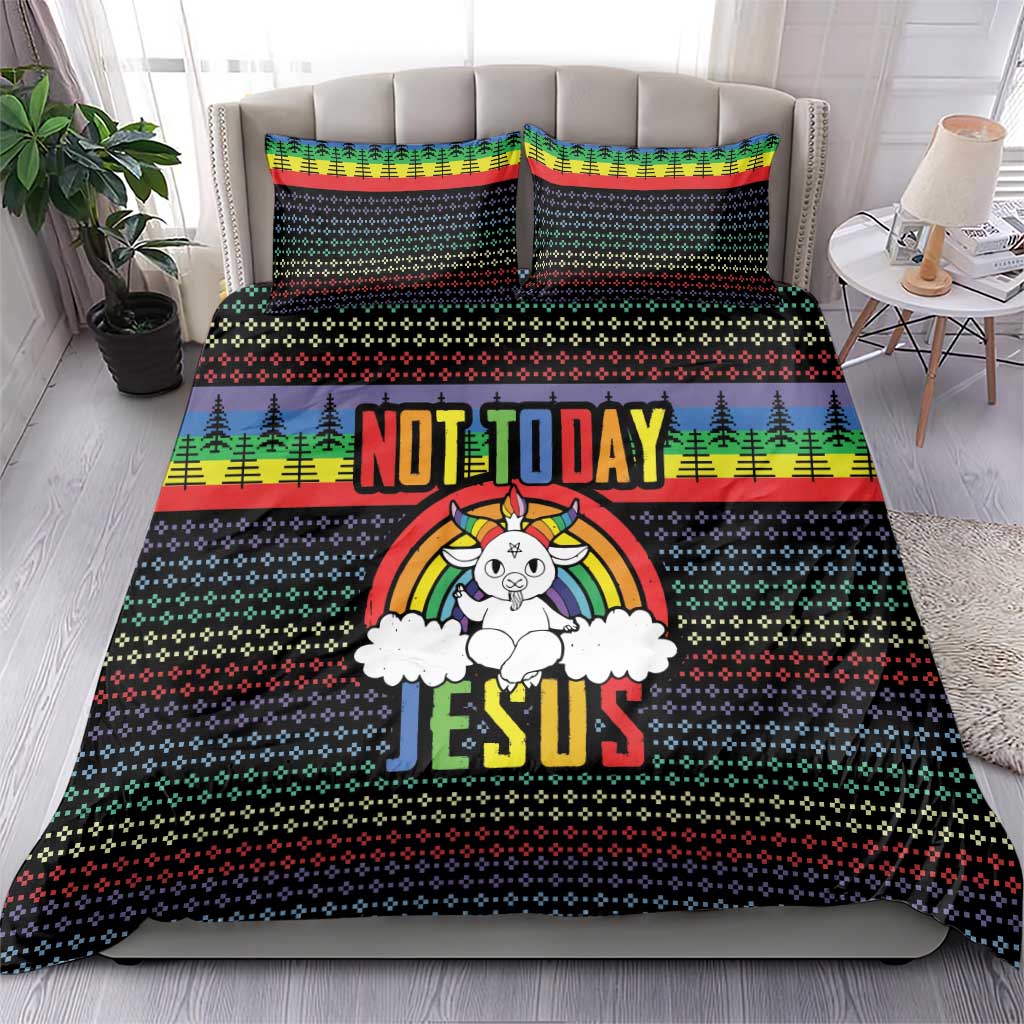 Christmas bedding set on bed: black duvet with rainbow stripe, trees, unicorn JESUS graphic, 2 pillows