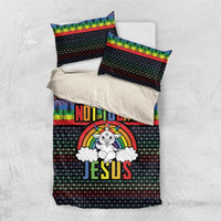 Christmas bedding set with black duvet, rainbow stripe trim, trees and JESUS graphic, 2 pillows