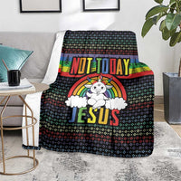 Christmas throw blanket draped on chair: rainbow unicorn and 'NOT TODAY JESUS' design