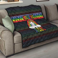 Black quilt on couch with rainbow stripe and pine trees, unicorn 'NOT TODAY JESUS' print