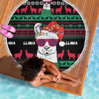 Round black llama beach blanket with tassel fringe, striped sunglasses llama in center