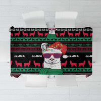 Folded llama Christmas tablecloth showing repeating llamas and stripes in black, green, red