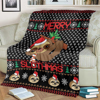 Black sloth Christmas blanket draped on couch, featuring 'Merry' and 'Slothmas' text