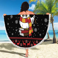 Black round Christmas beach blanket with owl, gold snowflake text, and red reindeer border fringe