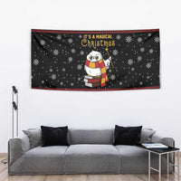 Black Christmas tapestry with owl holding a book and “It’s a Magical Christmas” text