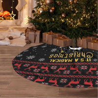 Black round tree skirt with snowflake print, red reindeer band, and Magical Christmas text