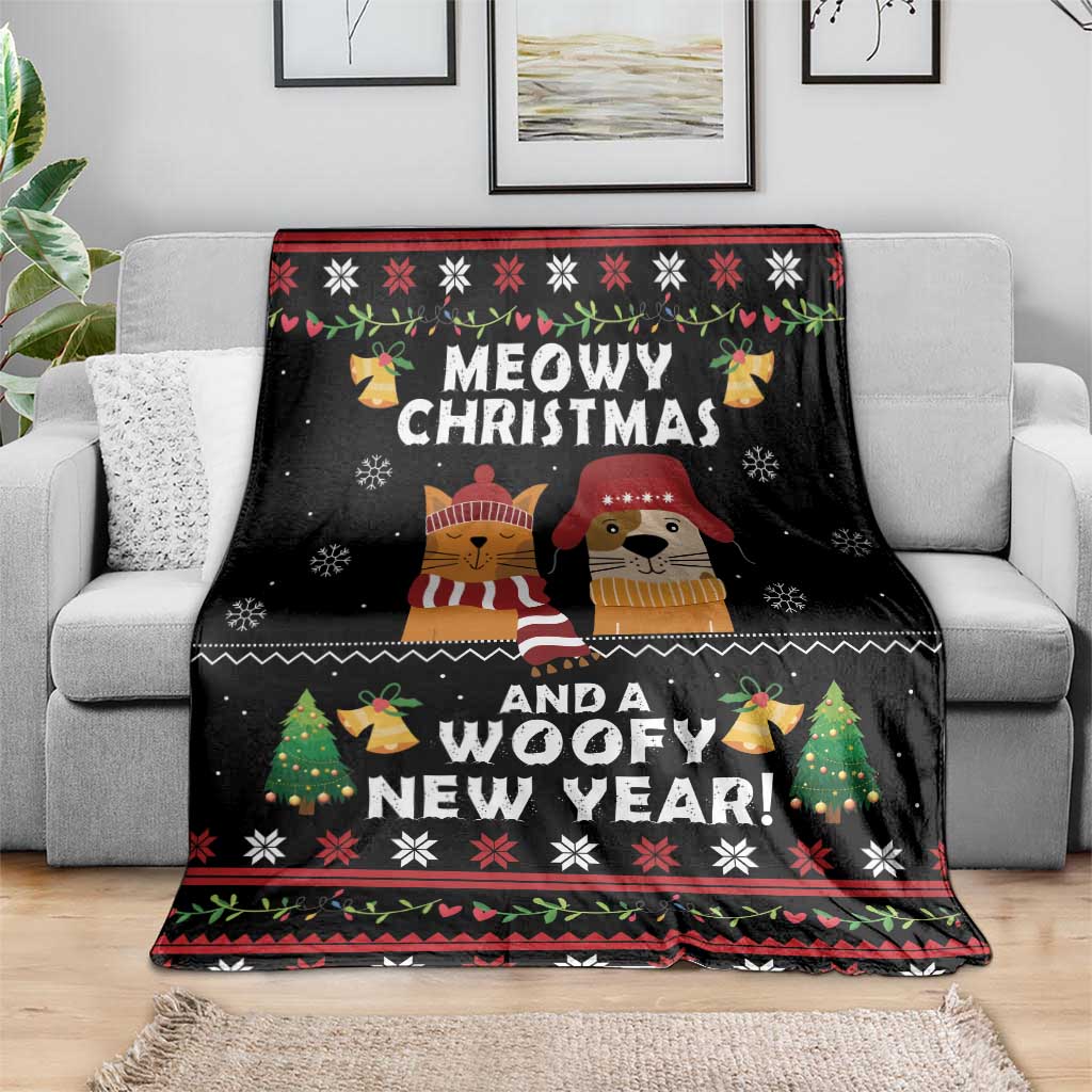 Black holiday blanket on sofa with cat and dog scene, Christmas and New Year lettering
