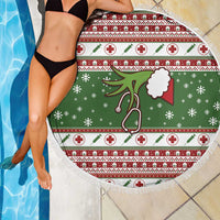 Round green Christmas beach blanket with nurse stethoscope design and white fringe trim