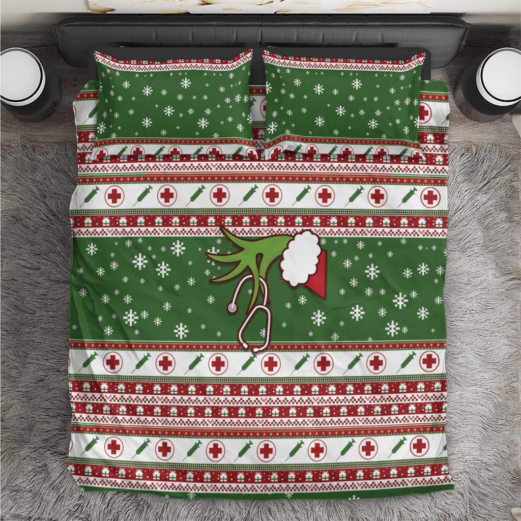 Green holiday bedding set with snowflakes, red cross icons, and festive striped bands