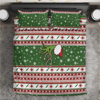 Green holiday bedding set with snowflakes, red cross icons, and festive striped bands