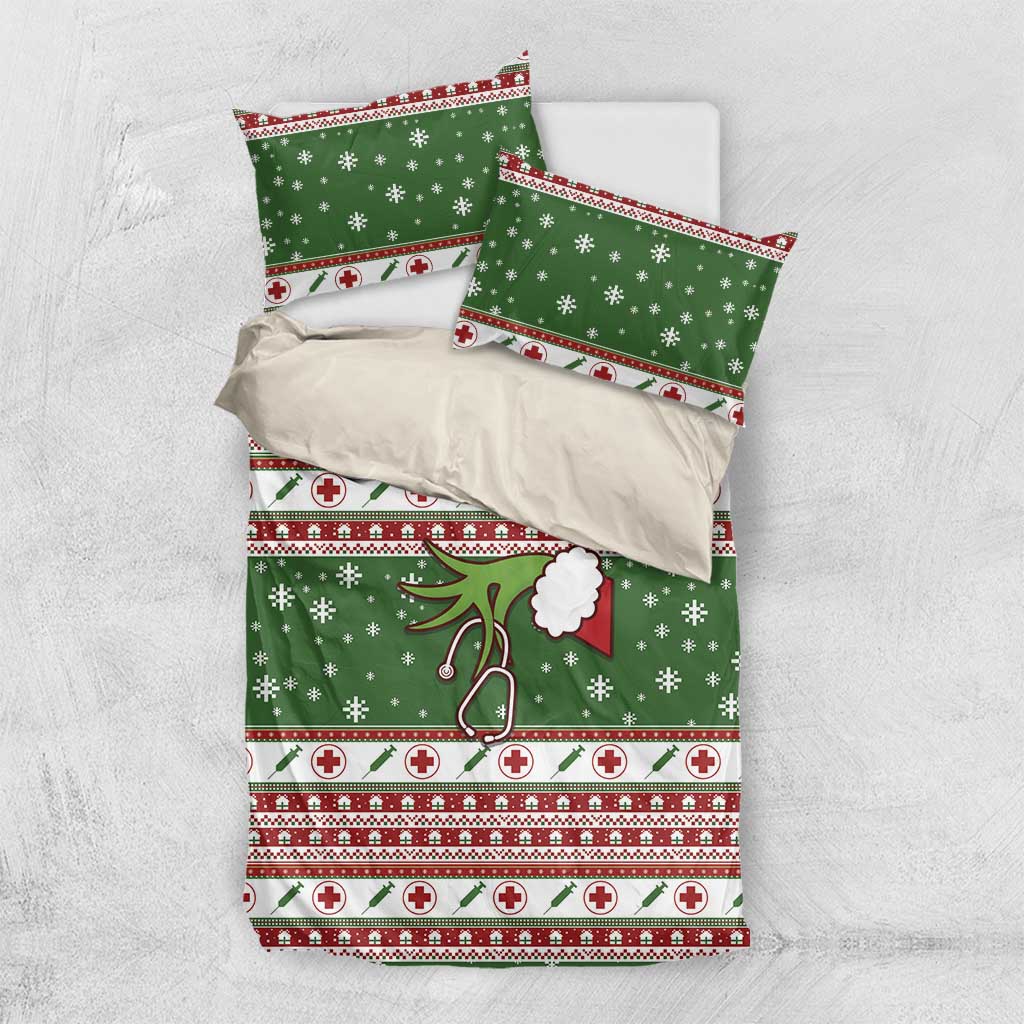 Green holiday duvet set with matching pillowcases; snowflakes and red cross icon stripes
