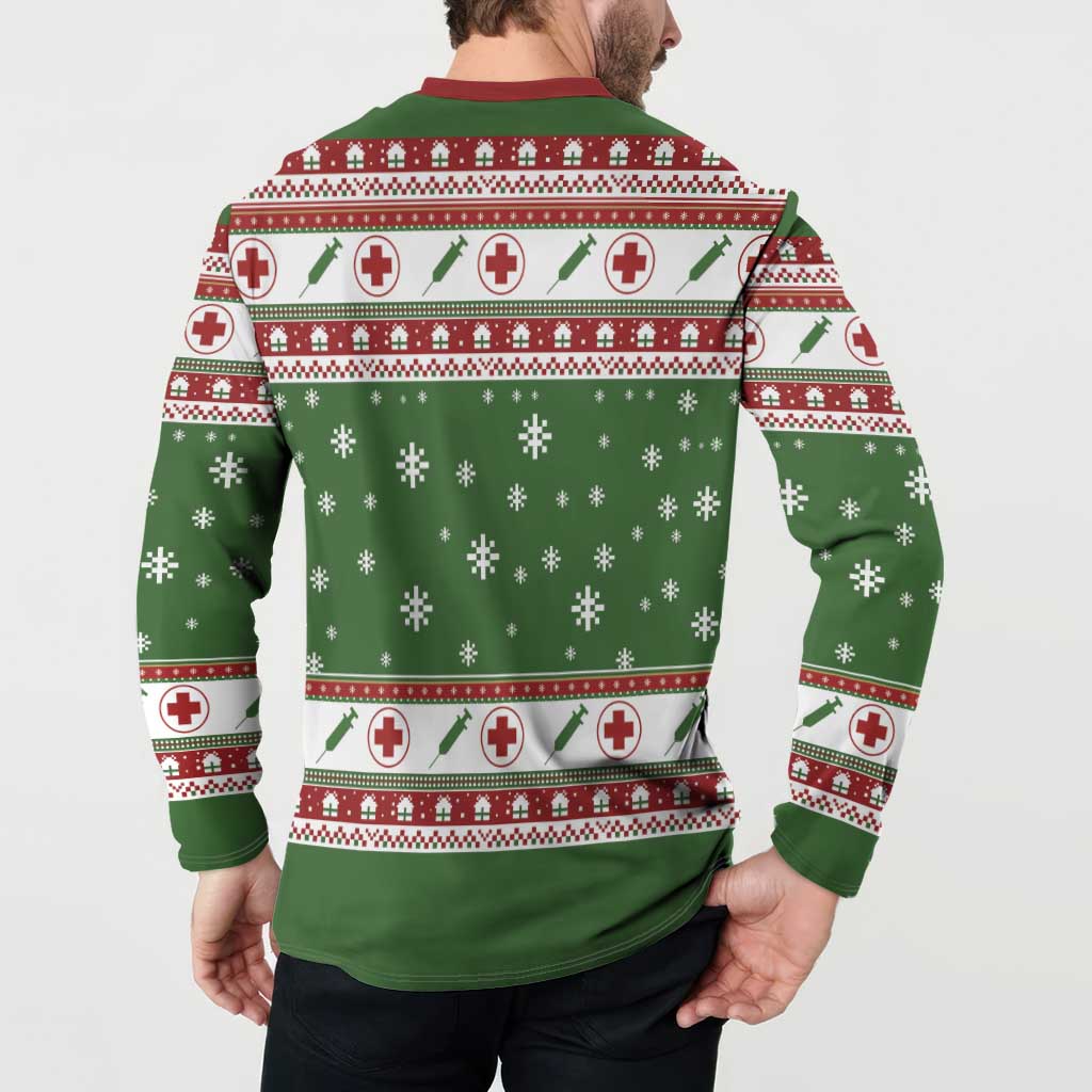 Green nurse-themed Christmas sweatshirt back view with red-and-white medical stripe and snowflakes