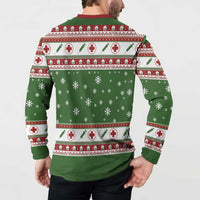 Green nurse-themed Christmas sweatshirt back view with red-and-white medical stripe and snowflakes