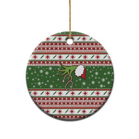 Round green ceramic nurse Christmas ornament with red-and-white holiday pattern and gold hanging cord