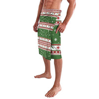 Green holiday sarong skirt with diagonal stripe panels and red-white trim at hem