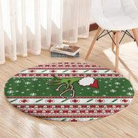Round Christmas rug with green base, red-and-white striped border and medical plus design
