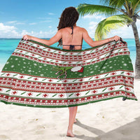 Green nurse-themed sarong with red cross stripes and snowflake pattern, tied at neck