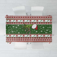 Green Christmas tablecloth with red-and-white medical cross and holiday motifs