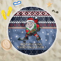 Blue round beach blanket with fringe, Santa hockey graphic and snowflake pattern