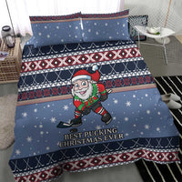Blue Christmas duvet set featuring hockey Santa elf, snowflake stars, and patterned stripes.