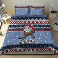 Blue bedding set with hockey Santa elf graphic and “Best Pucking Christmas Ever” text center.