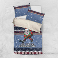 Blue holiday bedding set with hockey Santa elf, snow stars, and matching pillow covers.